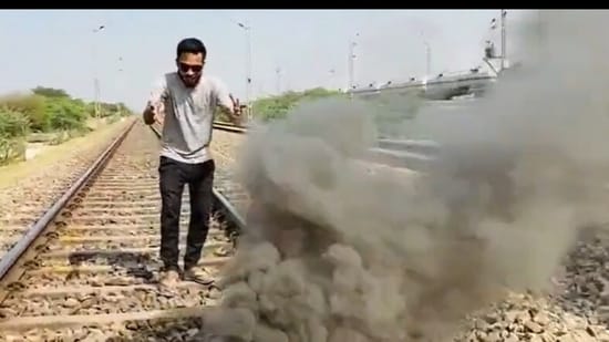YouTuber 'Stupid DTS' seen burning crackers on a railway track, (X/@Trains of India)