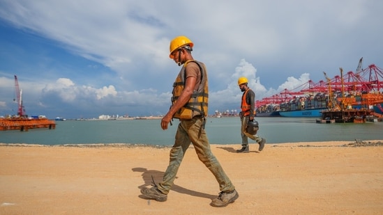 Workers at the Colombo West International Terminal (CWIT) project under construction in Colombo, Sri Lanka (Bloomberg)