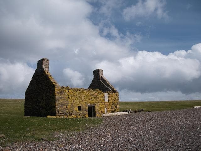 An abandoned croft or farm house on a pebble beach in Shetland. (AlanMorris/Shutterstock) An abandoned croft or farm house on a pebble beach in Shetland. (AlanMorris/Shutterstock)