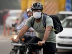 With deteriorating AQI in Noida, some residents have started wearing masks to protect themselves from pollution and smog. (Sunil Ghosh / Hindustan Times) With deteriorating AQI in Noida, some residents have started wearing masks to protect themselves from pollution and smog. (Sunil Ghosh / Hindustan Times)