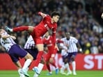 Luis Diaz (C) heads the ball ahead of Toulouse's Danish defender #03 Mikkel Desler Puggaard (L) during the UEFA Europa League Group E football match between Toulouse FC (TFC) and Liverpool
