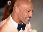 (FILES) US actor Dwayne Johnson attends the 95th Annual Academy Awards at the Dolby Theatre in Hollywood, California .(Photo by Robyn BECK / AFP)