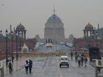 New Delhi: People move on the Kartavya Path after overnight rain, in New Delhi, New Delhi: People move on the Kartavya Path after overnight rain, in New Delhi,