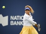 Naomi Osaka, of Japan, prepares to hit a return to Kaia Kanepi, of Estonia, during the National Bank Open tennis tournament