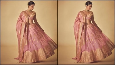 For her mesmerising look, Shanaya donned a regal lehenga ensemble in blush pink shade. It featured a plunging neckline blouse paired with a flared skirt adorned with a golden border. She completed her look with a matching duppata. (Instagram/@shanayakapoor02)