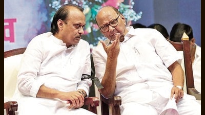 Ajit Pawar (left) and Sharad Pawar attended a family function in Pune on Friday. (HT PHOTO)