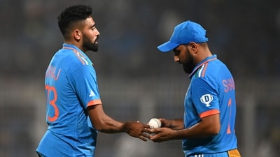 India's Mohammed Siraj (L) speaks with Mohammed Shami (AFP) India's Mohammed Siraj (L) speaks with Mohammed Shami (AFP)