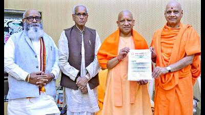 General secretary of Shri Ram Janmabhoomi Trust Champat Rai and treasurer Govind Dev Giri Maharaj invite UP chief minister Yogi Adityanath for the ‘Pran Pratishtha’ ceremony at the Ram Temple on January 22, 2024, in Lucknow on Friday. (ANI Photo) General secretary of Shri Ram Janmabhoomi Trust Champat Rai and treasurer Govind Dev Giri Maharaj invite UP chief minister Yogi Adityanath for the ‘Pran Pratishtha’ ceremony at the Ram Temple on January 22, 2024, in Lucknow on Friday. (ANI Photo)