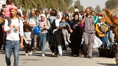 Palestinians fleeing north Gaza move southward as Israeli tanks roll deeper into the enclave. (REUTERS)