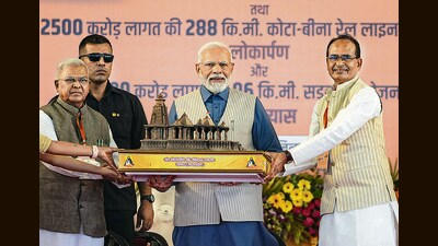 Prime Minister Narendra Modi being presented a memento during the foundation stone laying ceremony of the memorial of Sant Ravidas, in Sagar on August 12. (PTI) Prime Minister Narendra Modi being presented a memento during the foundation stone laying ceremony of the memorial of Sant Ravidas, in Sagar on August 12. (PTI)