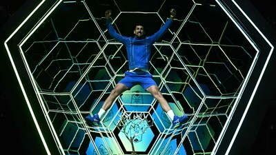 Serbia's Novak Djokovic jumps as he poses with the trophy after winning the men's singles final match of the Paris ATP Masters 1000 tennis tournament a (AFP) Serbia's Novak Djokovic jumps as he poses with the trophy after winning the men's singles final match of the Paris ATP Masters 1000 tennis tournament a (AFP)