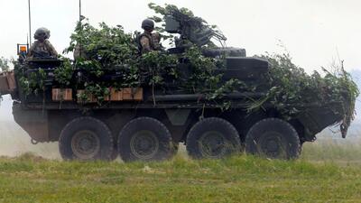 US army soldiers with their Stryker armoured fighting vehicle attend the final day of NATO Saber Strike exercises in Orzysz, Poland. (REUTERS FILE PHOTO) US army soldiers with their Stryker armoured fighting vehicle attend the final day of NATO Saber Strike exercises in Orzysz, Poland. (REUTERS FILE PHOTO)