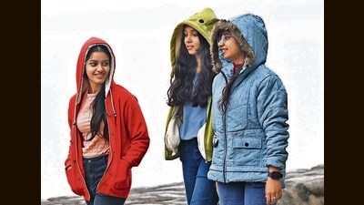 Visitors bundled up in winter wear at Sukhna Lake in Chandigarh following the rain on Friday. (Keshav Singh/HT) Visitors bundled up in winter wear at Sukhna Lake in Chandigarh following the rain on Friday. (Keshav Singh/HT)
