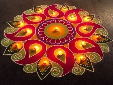 Craft a series of interconnected diyas with vibrant colours at your doorstep. (Pinterest) Craft a series of interconnected diyas with vibrant colours at your doorstep. (Pinterest)