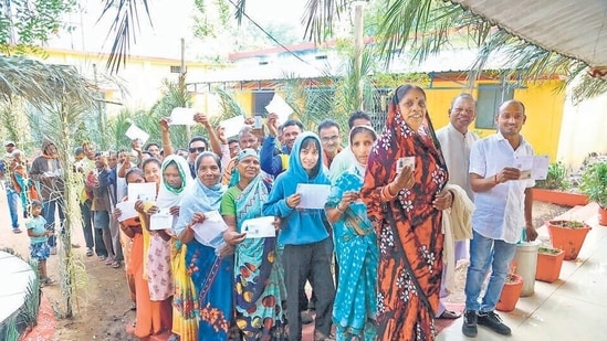 Voters outside a polling booth in Chhattisgarh’s Kanker district on Tuesday. (PTI) Voters outside a polling booth in Chhattisgarh’s Kanker district on Tuesday. (PTI)