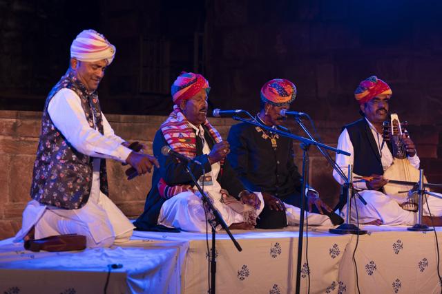 Bade Ghazi Khan Manganiyar (third from left) accompanied by Multan Khan Manganiyar (second from left) at Chokalao Bagh in Mehrangarh fort. (Courtesy JodhpurRIFF)