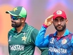 Babar Azam and Afghanistan's captain Hashmatullah Shahidi at the toss before the start of the World Cup 2023 match between Pakistan and Afghanistan Babar Azam and Afghanistan's captain Hashmatullah Shahidi at the toss before the start of the World Cup 2023 match between Pakistan and Afghanistan