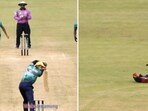 The image shows a cricketer taking a never-seen-before catch. The image shows a cricketer taking a never-seen-before catch.