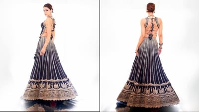 Her ensemble consisted of a backless black blouse adorned with intricate gold embroidery and a mesmerising tie up detailing at the back. She paired it with a matching flared skirt embellished with heavy sequin detailing and hand embroidery. (Instagram/@sukritigrover)
