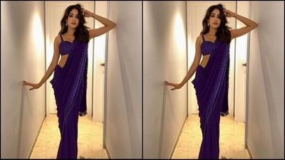 Her saree comes in an enchanting shade of purple and features intricate mirrored sequins and hand-embroidered cutdana detailing at the borders. She teamed it with a matching blouse with a sweetheart neckline. (Instagram/@janhvikapoor) Her saree comes in an enchanting shade of purple and features intricate mirrored sequins and hand-embroidered cutdana detailing at the borders. She teamed it with a matching blouse with a sweetheart neckline. (Instagram/@janhvikapoor)