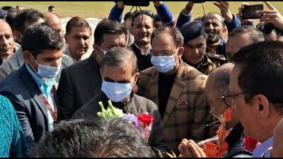 Himachal Pradesh chief minister Sukhvinder Singh Sukhu interacts with the media after landing at the Annadale helipad in Shimla on Saturday afternoon. (HT Photo)