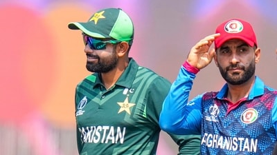 Babar Azam and Afghanistan's captain Hashmatullah Shahidi at the toss before the start of the World Cup 2023 match between Pakistan and Afghanistan (PTI) Babar Azam and Afghanistan's captain Hashmatullah Shahidi at the toss before the start of the World Cup 2023 match between Pakistan and Afghanistan (PTI)