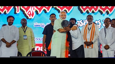 Prime Minister Narendra Modi consoles Madiga Reservation Porata Samithi chief Manda Krishna Madiga during a public meeting, in Secunderabad on Saturday. (PTI) Prime Minister Narendra Modi consoles Madiga Reservation Porata Samithi chief Manda Krishna Madiga during a public meeting, in Secunderabad on Saturday. (PTI)