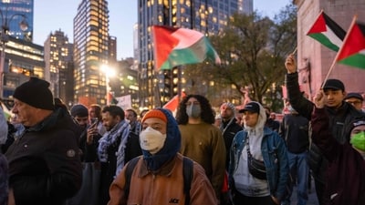 NEW YORK, NEW YORK - NOVEMBER 10: Hundreds of Palestine supporters march and rally in Columbus Circle in Manhattan on November 10, 2023 in New York City. The group has called for a cease fire in fighting between Israel and Hamas militants in Gaza which has now left an estimated 11,000 Gazans dead following the October 7th Hamas terrorist attack on Israel. (Getty Images via AFP) NEW YORK, NEW YORK - NOVEMBER 10: Hundreds of Palestine supporters march and rally in Columbus Circle in Manhattan on November 10, 2023 in New York City. The group has called for a cease fire in fighting between Israel and Hamas militants in Gaza which has now left an estimated 11,000 Gazans dead following the October 7th Hamas terrorist attack on Israel. (Getty Images via AFP)