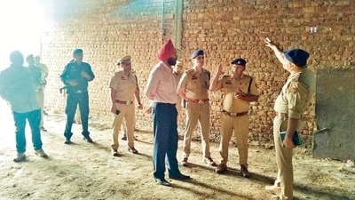 Police officials inspect the site in Ambala district where the illicit liquor was being produced, on Saturday. (HT Photo) Police officials inspect the site in Ambala district where the illicit liquor was being produced, on Saturday. (HT Photo)