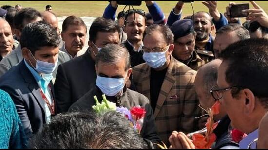 Himachal Pradesh chief minister Sukhvinder Singh Sukhu interacts with the media after landing at the Annadale helipad in Shimla on Saturday afternoon. (HT Photo)