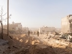 Israeli soldiers take position, amid the ongoing ground operation of the Israeli army against Palestinian Islamist group Hamas, in the Gaza Strip.