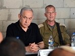 Israeli Prime Minister Benjamin Netanyahu meets with soldiers.