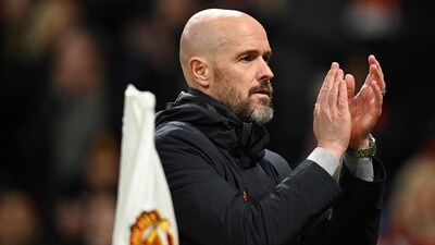 Manchester United's Dutch manager Erik ten Hag applauds at the end of the English Premier League football match between Manchester United and Luton Town (AFP)