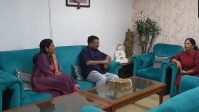 Delhi CM Arvind Kejriwal with Sanjay Singh’s family. (ANI) Delhi CM Arvind Kejriwal with Sanjay Singh’s family. (ANI)