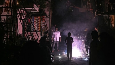 Revellers light firecrackers during Diwali in New Delhi on November 12. (AFP)