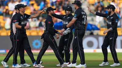 Trent Boult celebrates with teammates after taking the catch of Sri Lanka's Dushmantha Chameera during the ICC Men's Cricket World Cup 2023 match. (PTI) Trent Boult celebrates with teammates after taking the catch of Sri Lanka's Dushmantha Chameera during the ICC Men's Cricket World Cup 2023 match. (PTI)