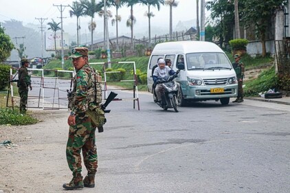 This photo taken on November 10, 2023 shows fighters of the ethnic rebel group Ta'ang National Liberation Army (TNLA) standing guard at a check point in the town of Namhkam in northern Shan state. (AFP) This photo taken on November 10, 2023 shows fighters of the ethnic rebel group Ta'ang National Liberation Army (TNLA) standing guard at a check point in the town of Namhkam in northern Shan state. (AFP)