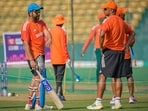 India's captain Rohit Sharma, left, speaks to head coach Rahul Dravid during a practice session India's captain Rohit Sharma, left, speaks to head coach Rahul Dravid during a practice session