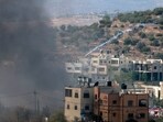 Palestinians clash with Israeli soldiers after Jewish settlers stormed the Palestinian West Bank village of Dayr Sharaf. Palestinians clash with Israeli soldiers after Jewish settlers stormed the Palestinian West Bank village of Dayr Sharaf.