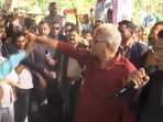 Chhattisgarh CM Bhupesh Baghel getting whiplashed as part of a ritual.