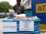 Snapshot of the peanut seller with his stall. Snapshot of the peanut seller with his stall.