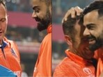 Virat Kohli gifts his jersey to Roelof van der Merwe.