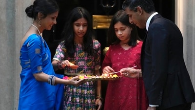 Britain's Prime Minister Rishi Sunak lights candles with his wife Akshata Murty and daughters to celebrate Diwali at 10 Downing Street. (AP) Britain's Prime Minister Rishi Sunak lights candles with his wife Akshata Murty and daughters to celebrate Diwali at 10 Downing Street. (AP)