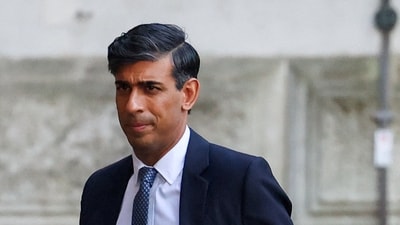Britain's prime minister Rishi Sunak walks outside 10 Downing Street in London. (Reuters)