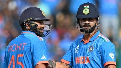 India's Virat Kohli (R) pats captain Rohit Sharma on scoring a half-century (50 runs) during the 2023 ICC Men's Cricket World Cup one-day international (ODI) match between India and Netherlands at the M. Chinnaswamy Stadium (AFP) India's Virat Kohli (R) pats captain Rohit Sharma on scoring a half-century (50 runs) during the 2023 ICC Men's Cricket World Cup one-day international (ODI) match between India and Netherlands at the M. Chinnaswamy Stadium (AFP)