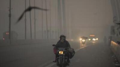 Commuters travel on the Signature Bridge amid low visibility as the air quality again goes down to the ‘poor’ category in New Delhi on November 13. (ANI) Commuters travel on the Signature Bridge amid low visibility as the air quality again goes down to the ‘poor’ category in New Delhi on November 13. (ANI)