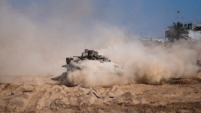 Israel-Hamas War: Israeli military vehicle manoeuvres during the ongoing ground operation of the Israeli army against Hamas, in the Gaza Strip. (Reuters)