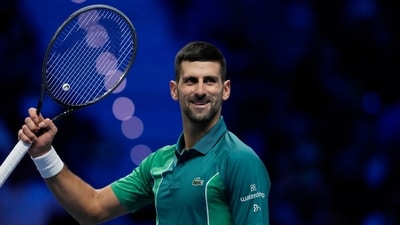 Serbia's Novak Djokovic celebrates after winning the singles tennis match against Denmark's Holger Rune, of the ATP World Tour Finals at the Pala Alpitour, in Turin (AP) Serbia's Novak Djokovic celebrates after winning the singles tennis match against Denmark's Holger Rune, of the ATP World Tour Finals at the Pala Alpitour, in Turin (AP)