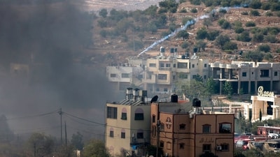 Palestinians clash with Israeli soldiers after Jewish settlers stormed the Palestinian West Bank village of Dayr Sharaf. (AFP) Palestinians clash with Israeli soldiers after Jewish settlers stormed the Palestinian West Bank village of Dayr Sharaf. (AFP)