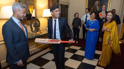 Jaishankar gifted cricket bat with Virat Kohli's autograph to UK PM Rishi Sunak. (X/@10DowningStreet) Jaishankar gifted cricket bat with Virat Kohli's autograph to UK PM Rishi Sunak. (X/@10DowningStreet)